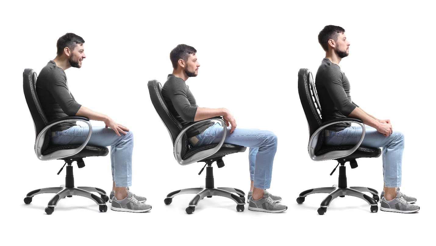 A man sitting in an office chair demonstrating slouched, neutral, and upright postures